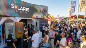 Large crowd engaging with immersive brand experience activation at cultural festival.